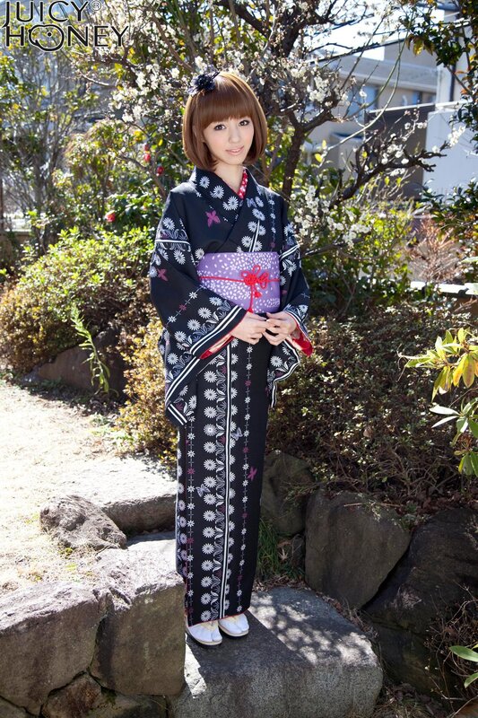 Woman in kimono outdoors