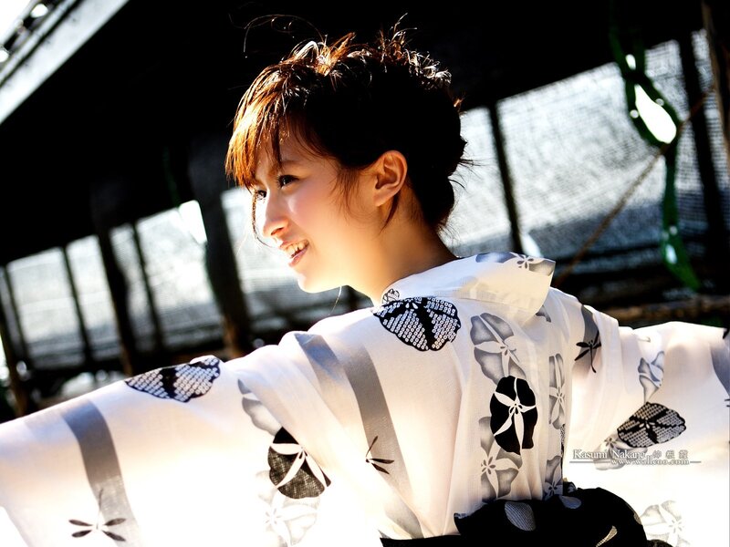 Woman in kimono smiling