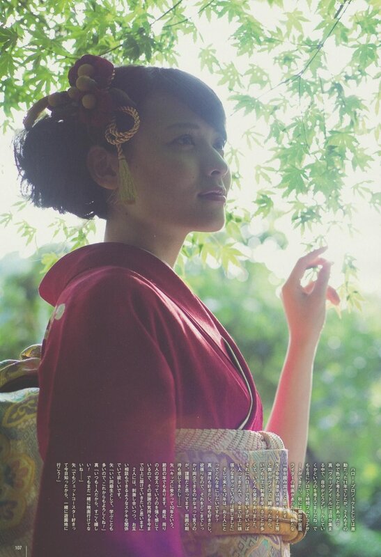 woman in kimono under trees