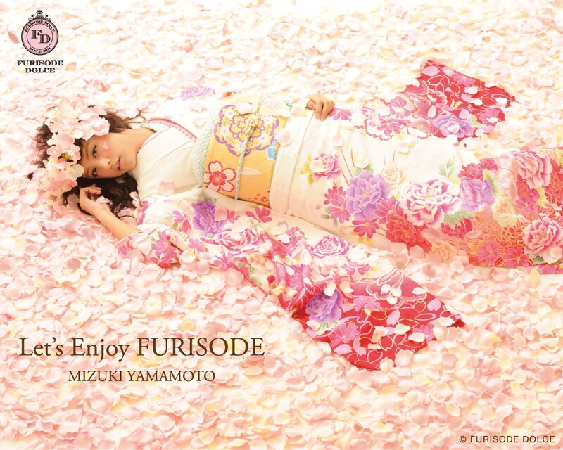 Woman in kimono with petals