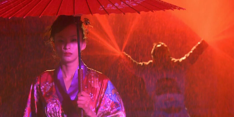 woman in kimono with red umbrella
