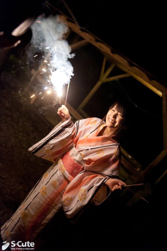 Woman in kimono with sparkler