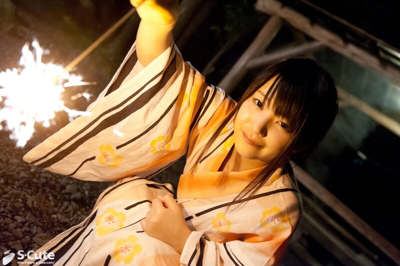 Woman in kimono with sparkler