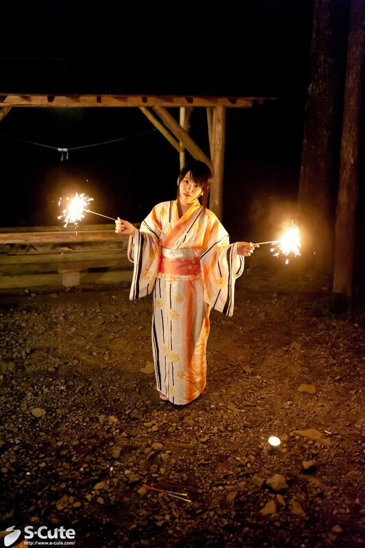 Woman in kimono with sparklers