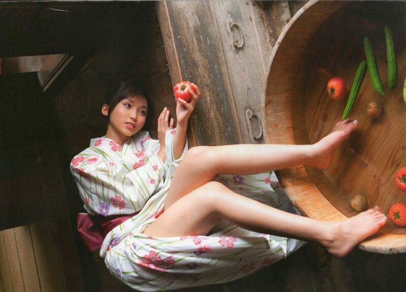 Woman in kimono with vegetables
