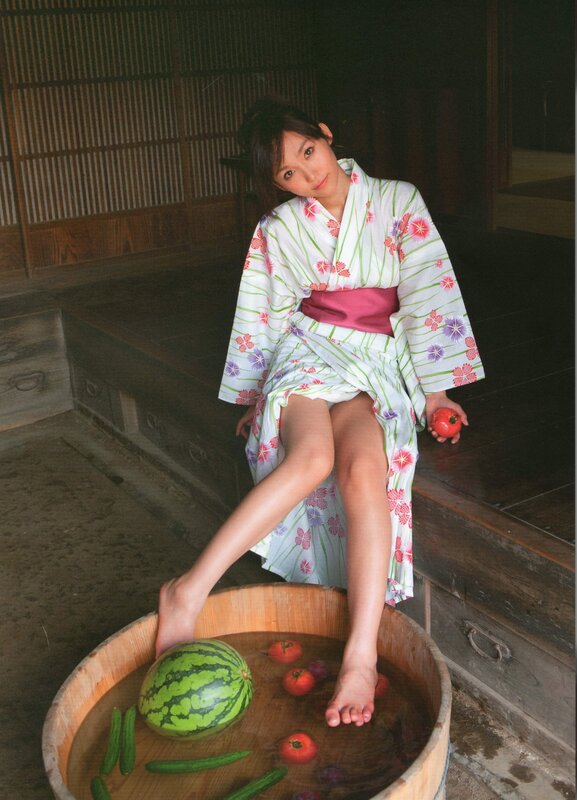 Woman in kimono with watermelon