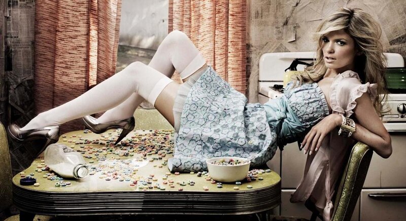 woman in kitchen with cereal mess