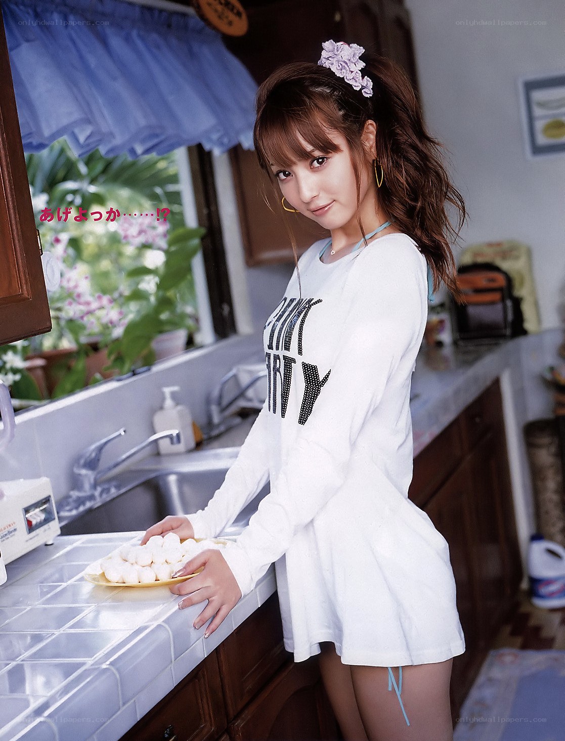 woman in kitchen with dumplings