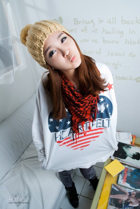 woman in knit hat and scarf