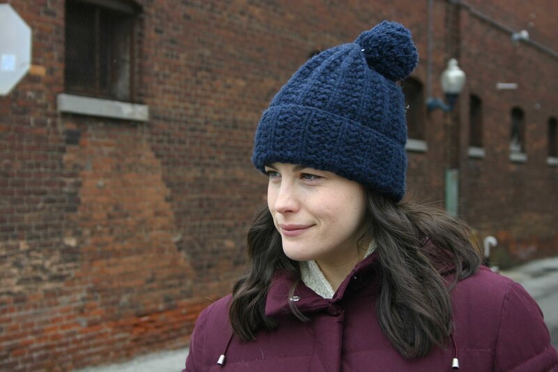 woman in knit hat outdoors