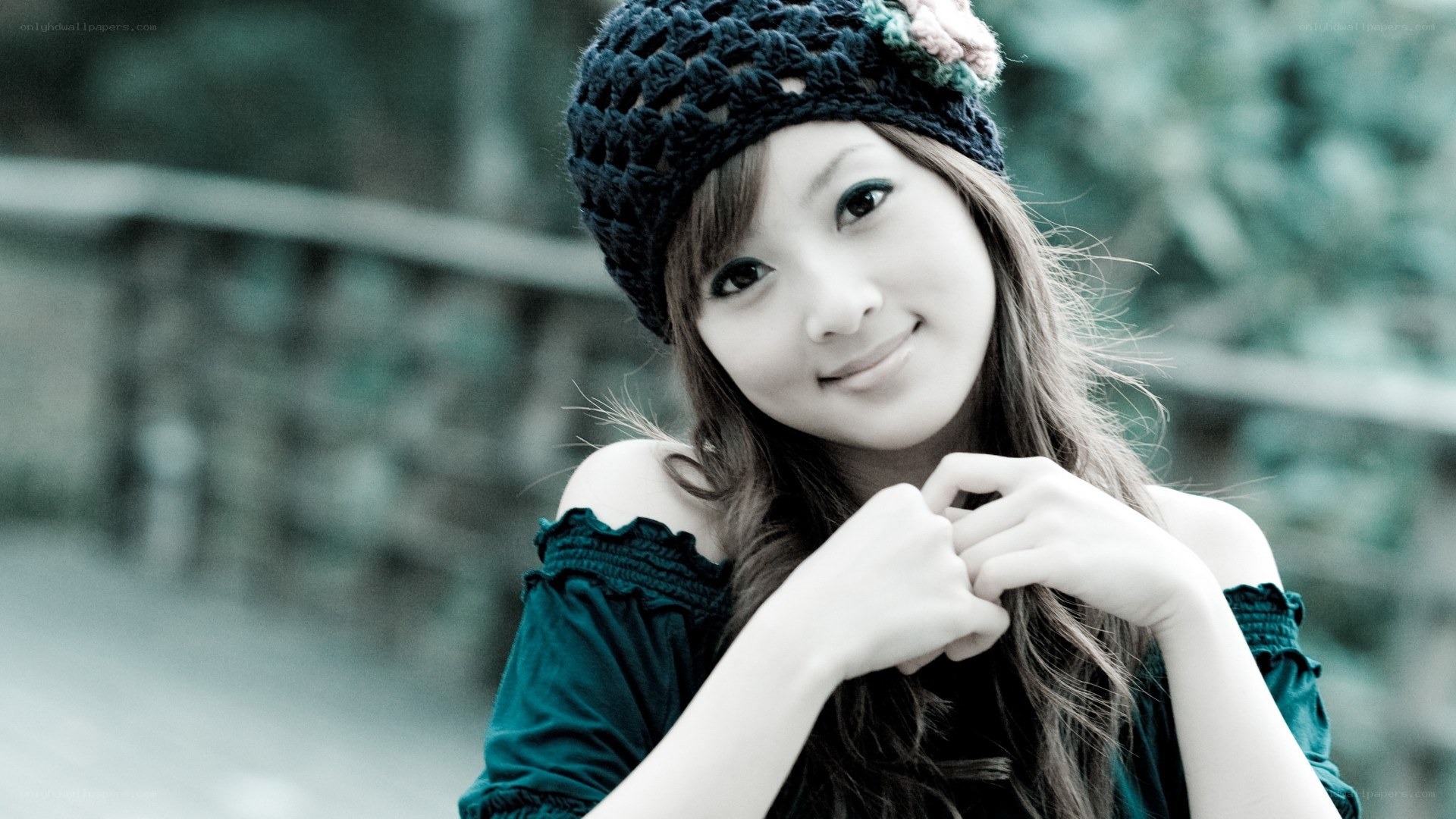woman in knitted hat smiling