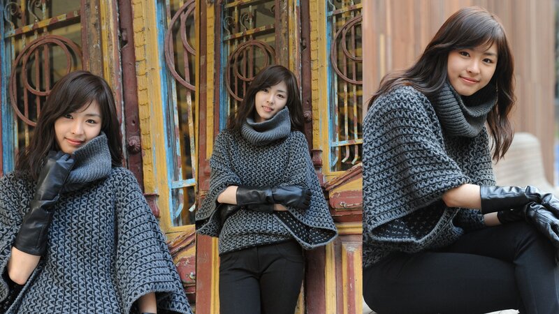 woman in knitted poncho