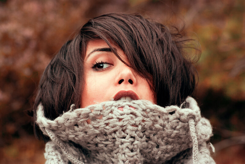woman in knitted scarf