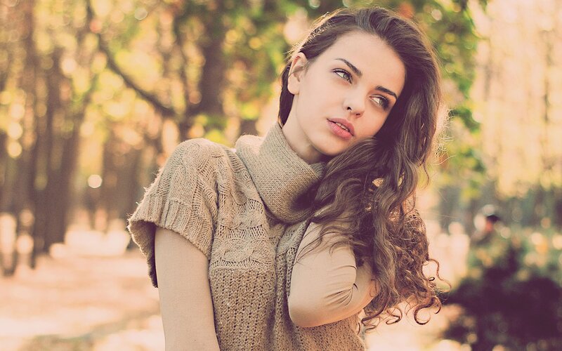 woman in knitted sweater outdoors