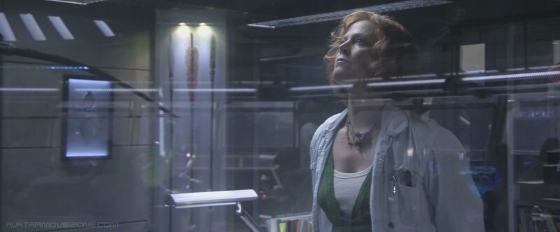 woman in lab looking up