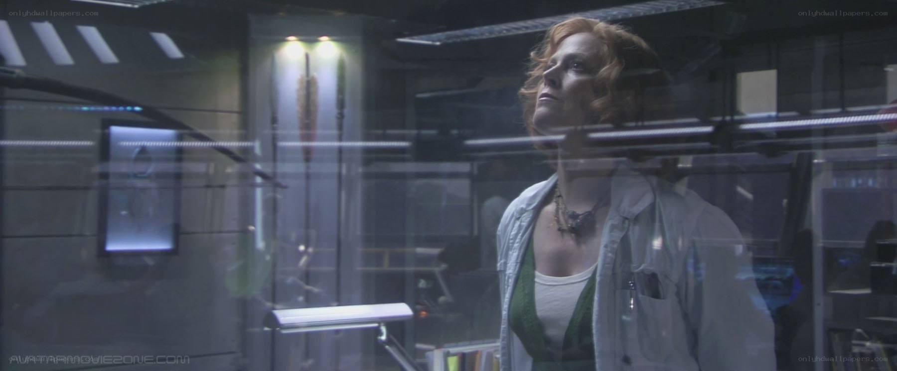 woman in lab looking up