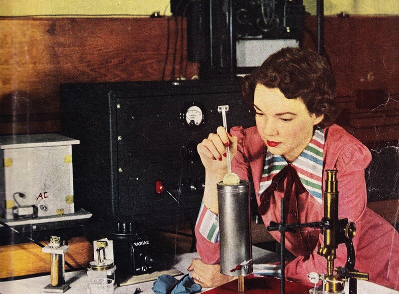 Woman in lab with scientific equipment