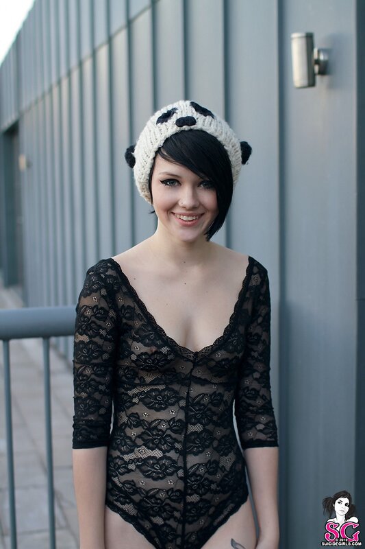 Woman in lace bodysuit and panda hat