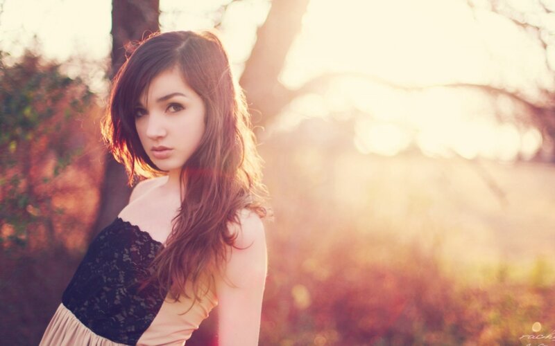 woman in lace dress at sunset