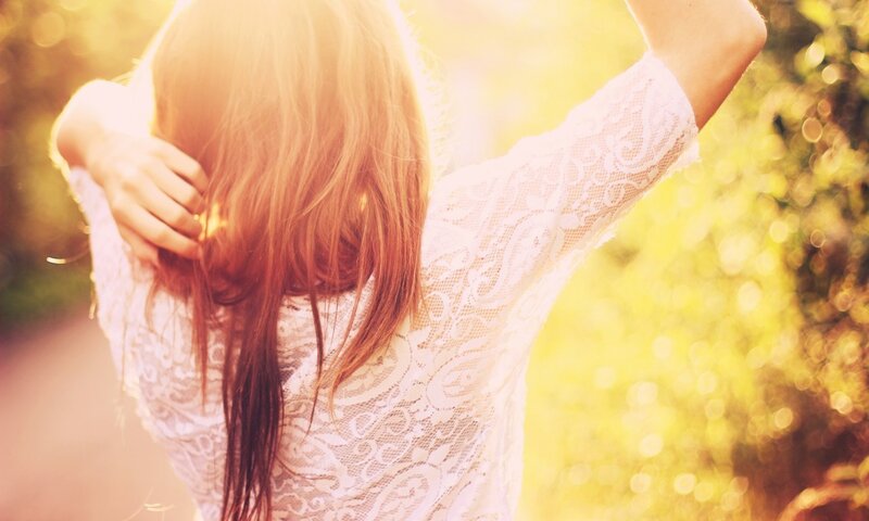 woman in lace dress at sunset