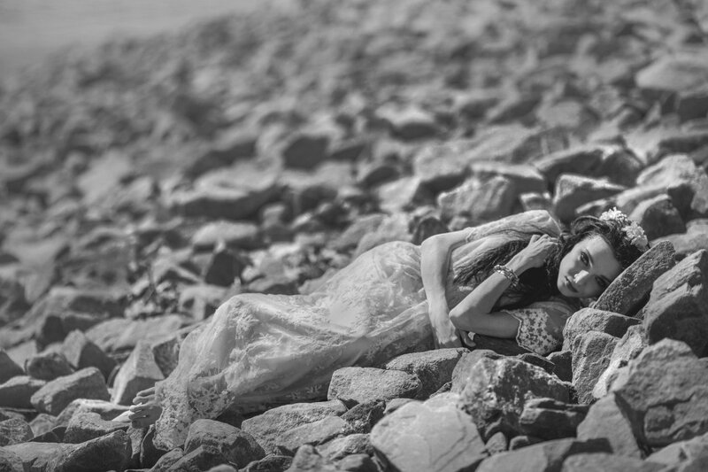 Woman in Lace Dress — Black, Dramatic, Photograph, Rocks