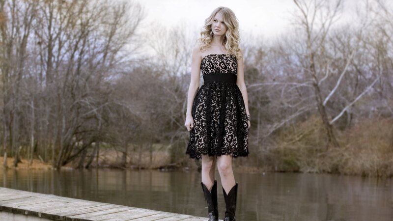 woman in lace dress on dock
