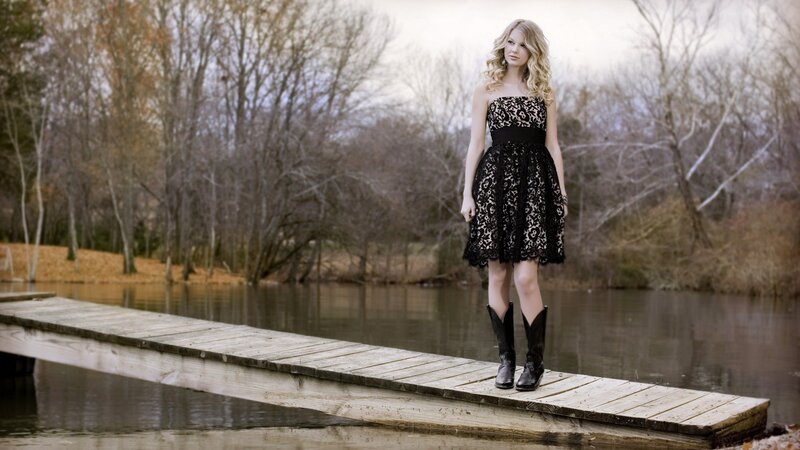 woman in lace dress on dock