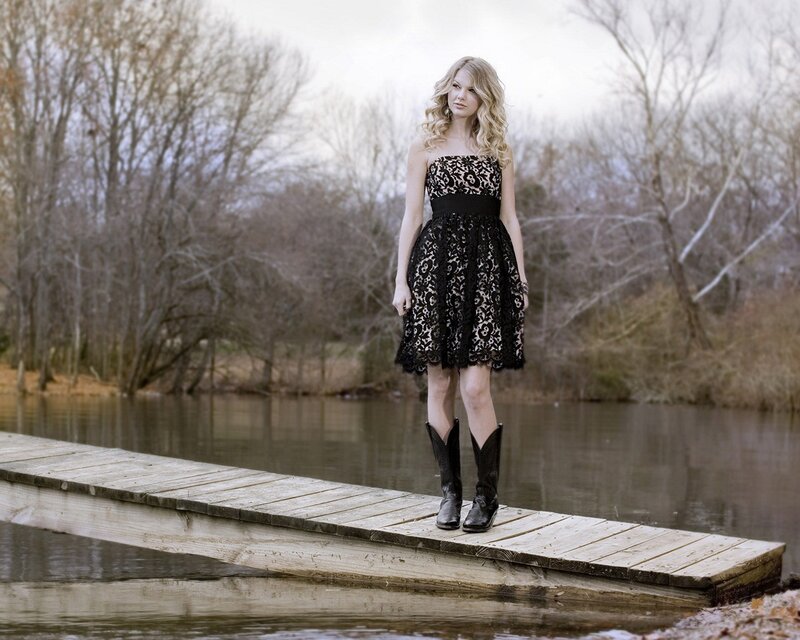 woman in lace dress on dock