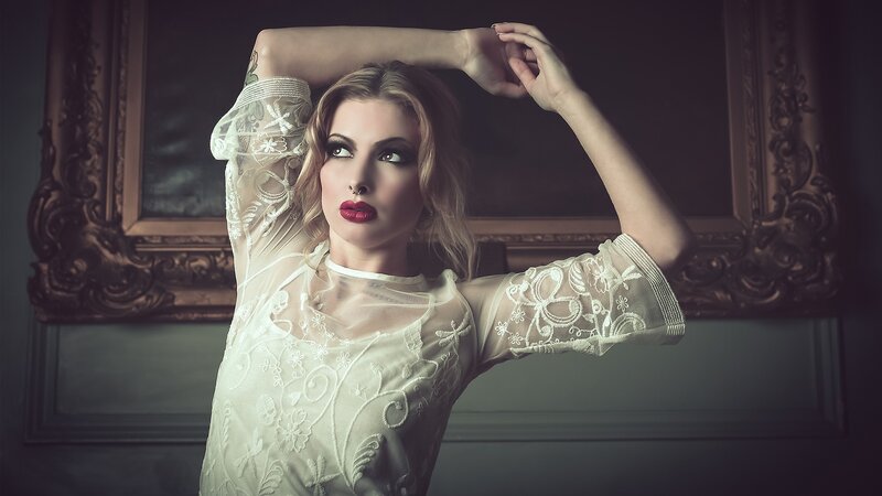 woman in lace dress posing
