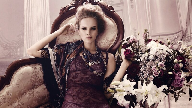 woman in lace dress with flowers