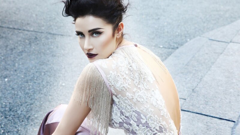woman in lace dress with fringe