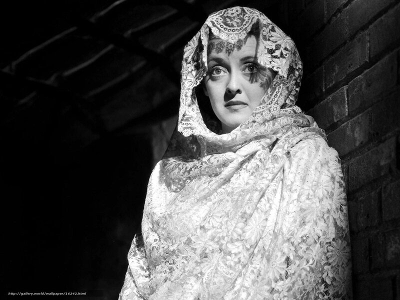 woman in lace headscarf