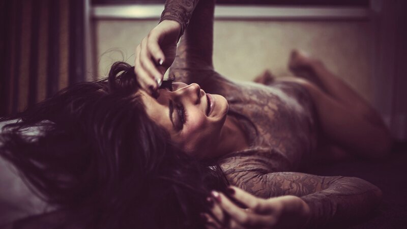 woman in lace lying down