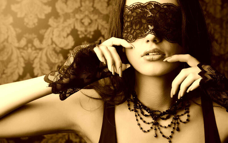 woman in lace mask and gloves