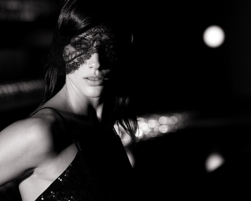 woman in lace mask at night