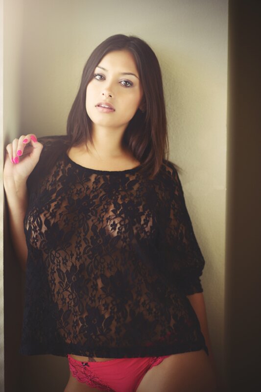 woman in lace top and pink underwear
