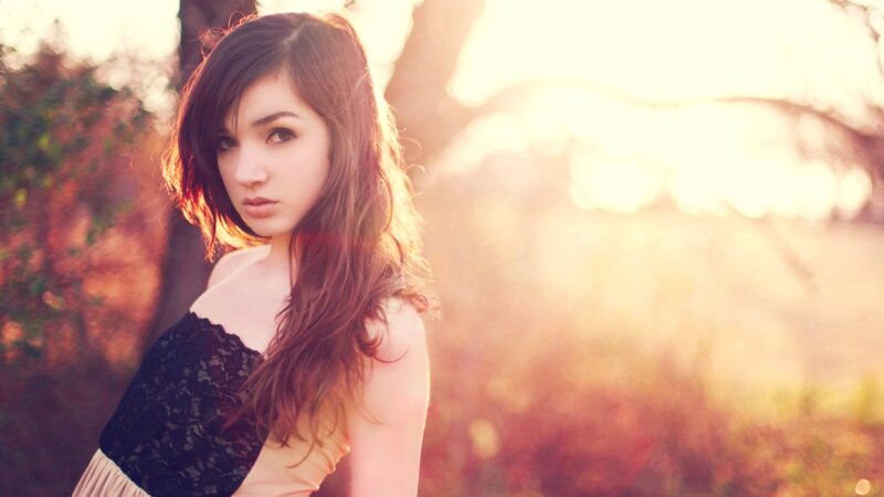 woman in lace top at sunset