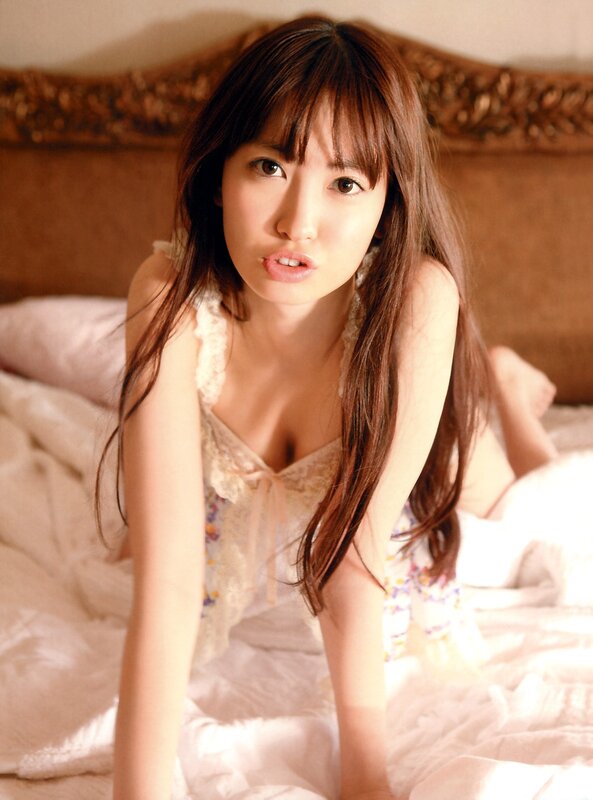 woman in lace top on bed