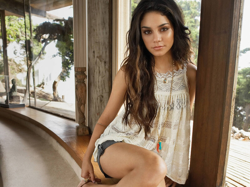 woman in lace top sitting