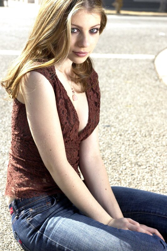 woman in lace top sitting