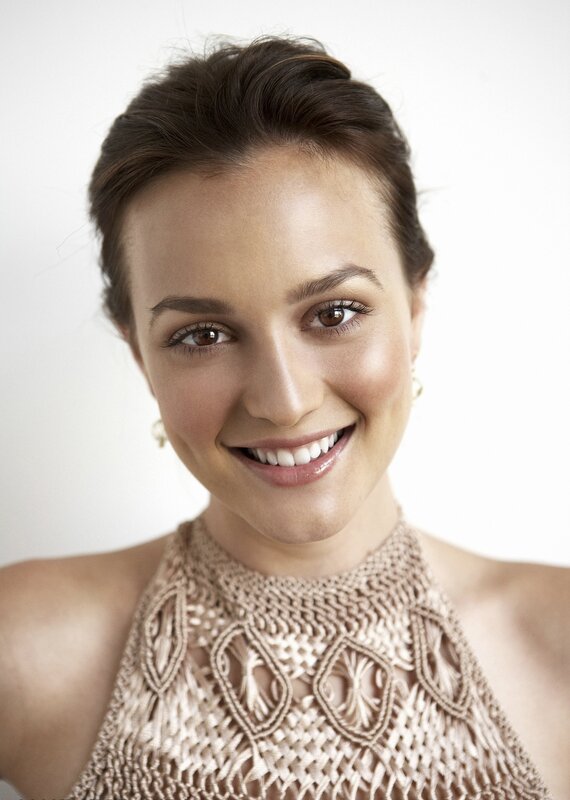 woman in lace top smiling
