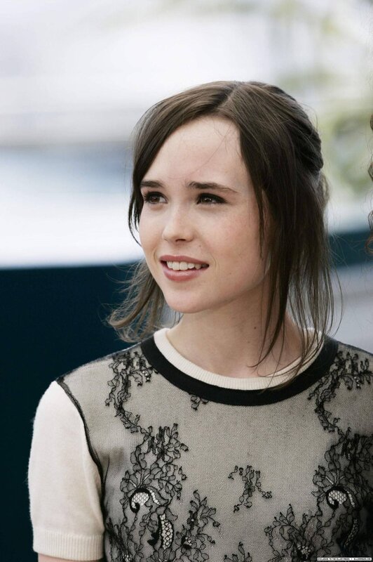 woman in lace top smiling