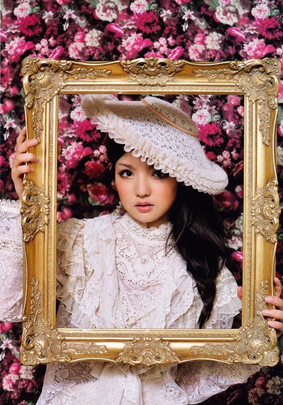 woman in lace with golden frame