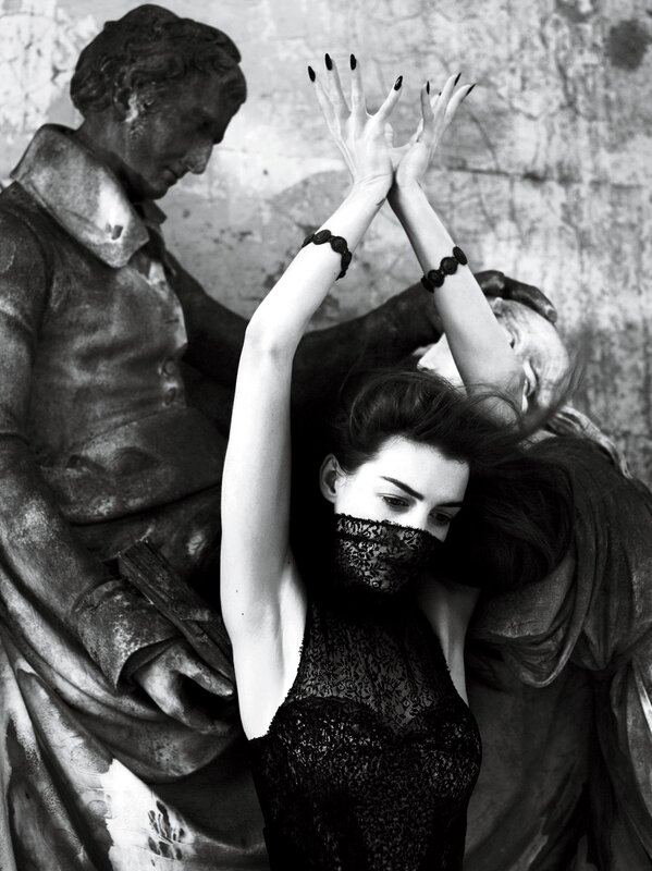 woman in lace with statue