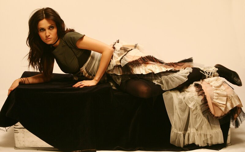 woman in layered dress posing