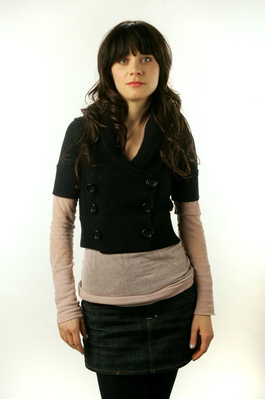 woman in layered sweater outfit