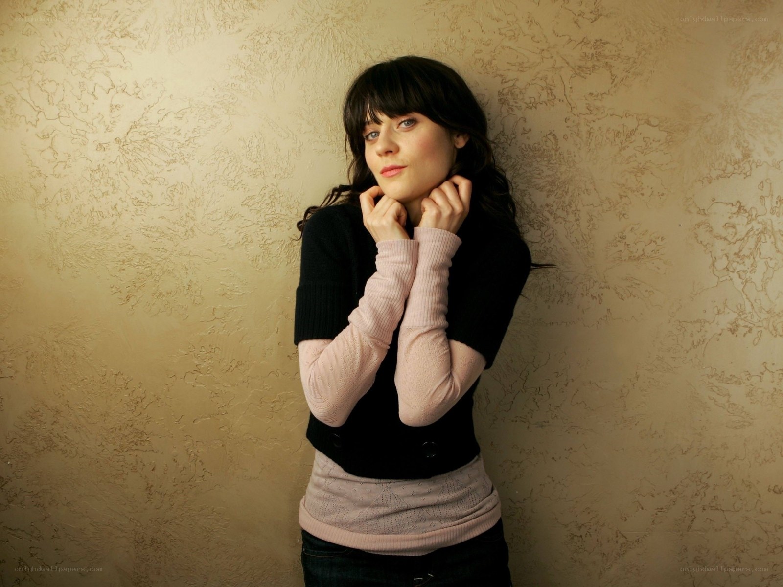 woman in layered sweaters