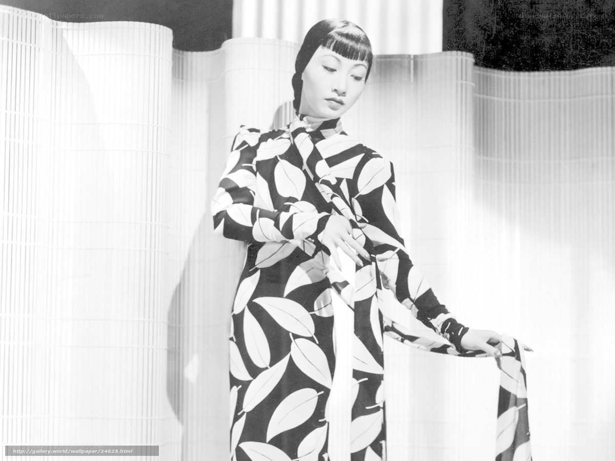 woman in leaf-patterned dress