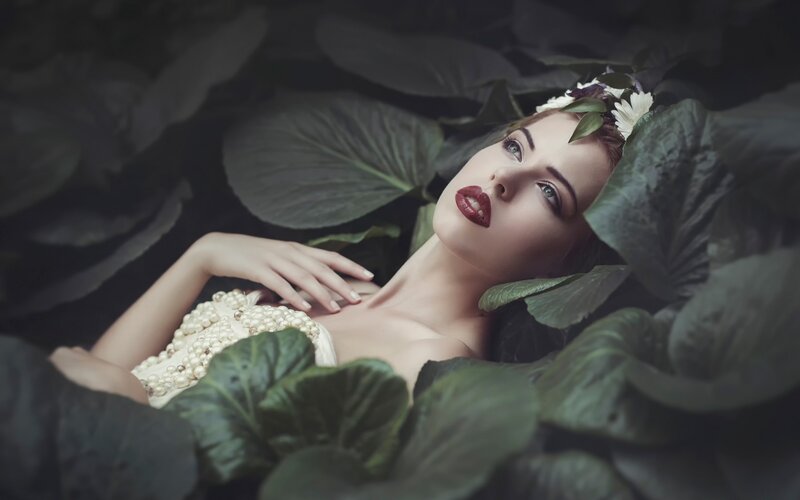woman in leafy garden