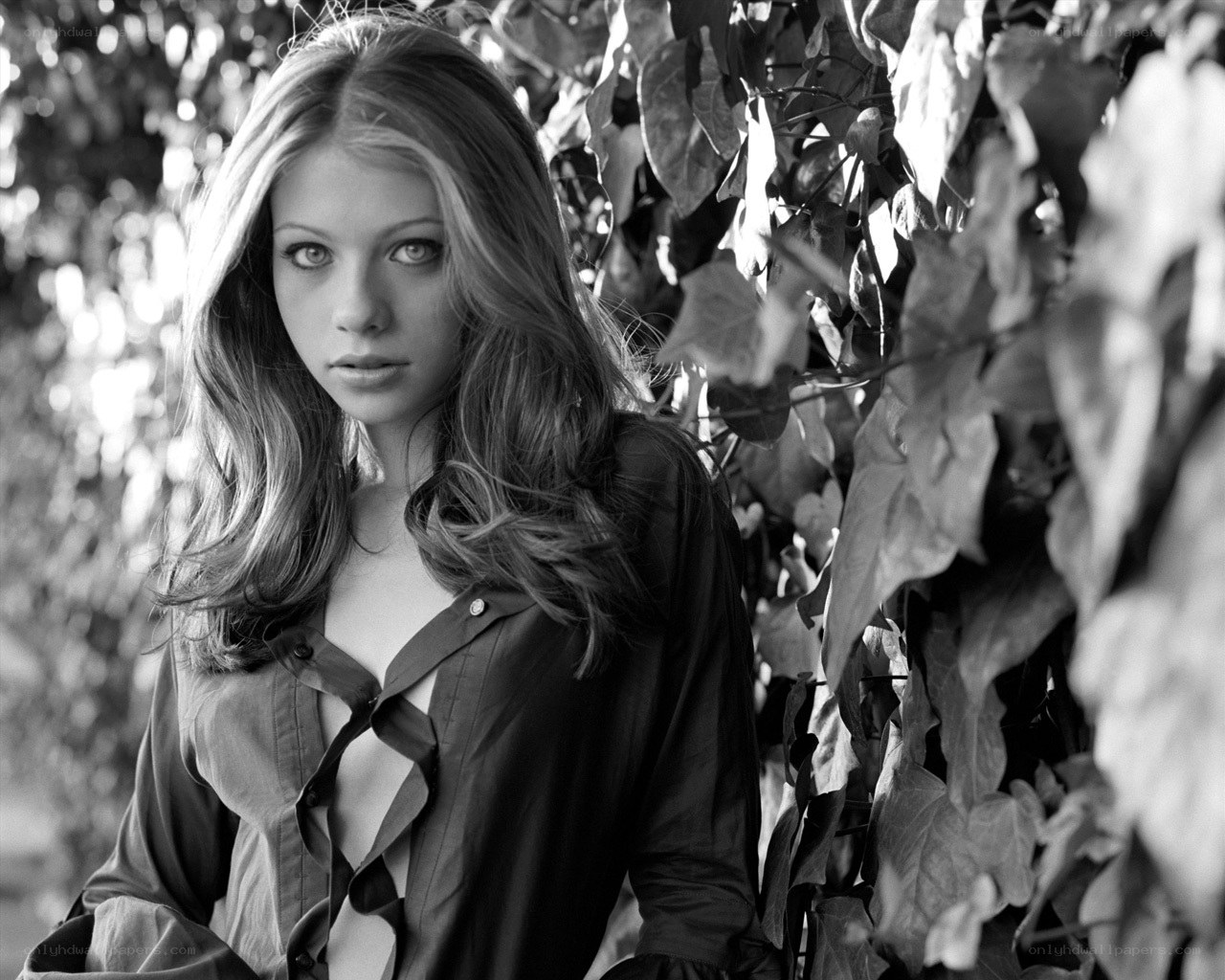 woman in leafy setting